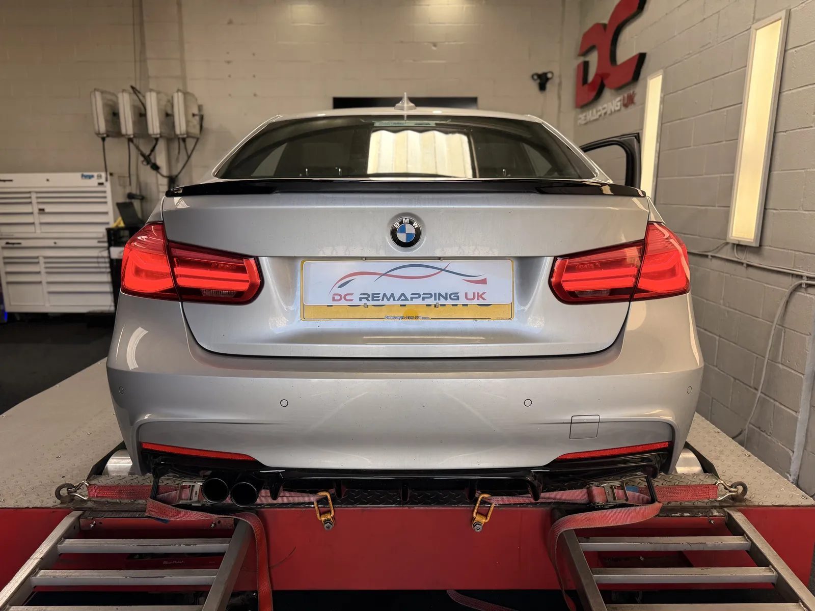 BMW 335d xDrive rear view on the dyno