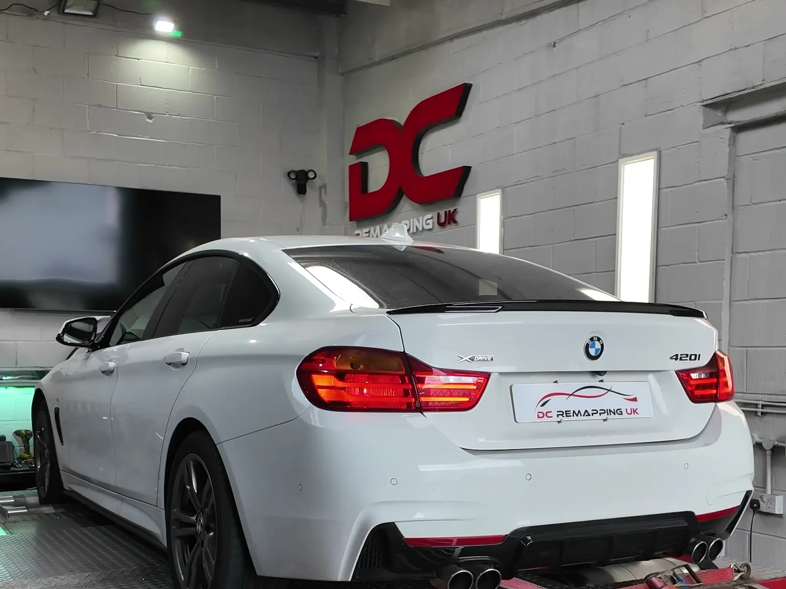 BMW 420i xDrive Gran Coupé rear view on the dyno
