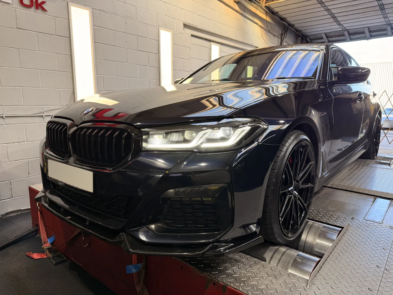 BMW 530d xDrive front three-quarter on the dyno