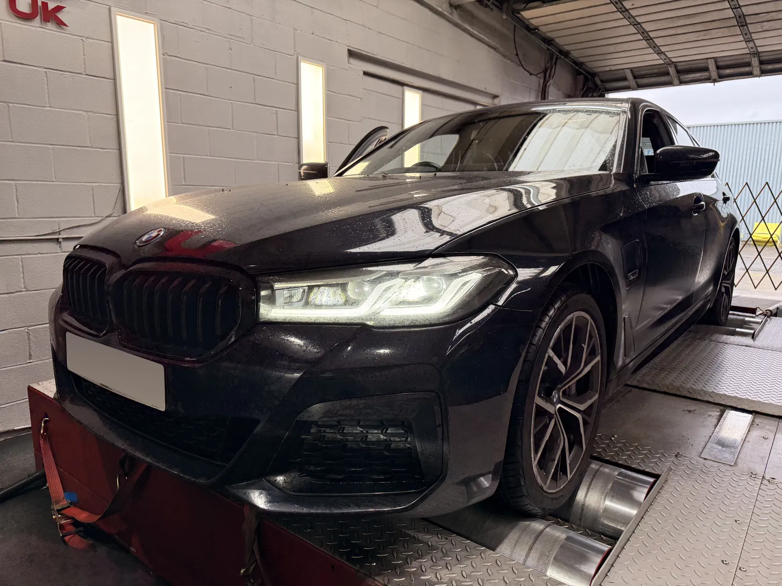BMW 530e front three-quarter on the dyno