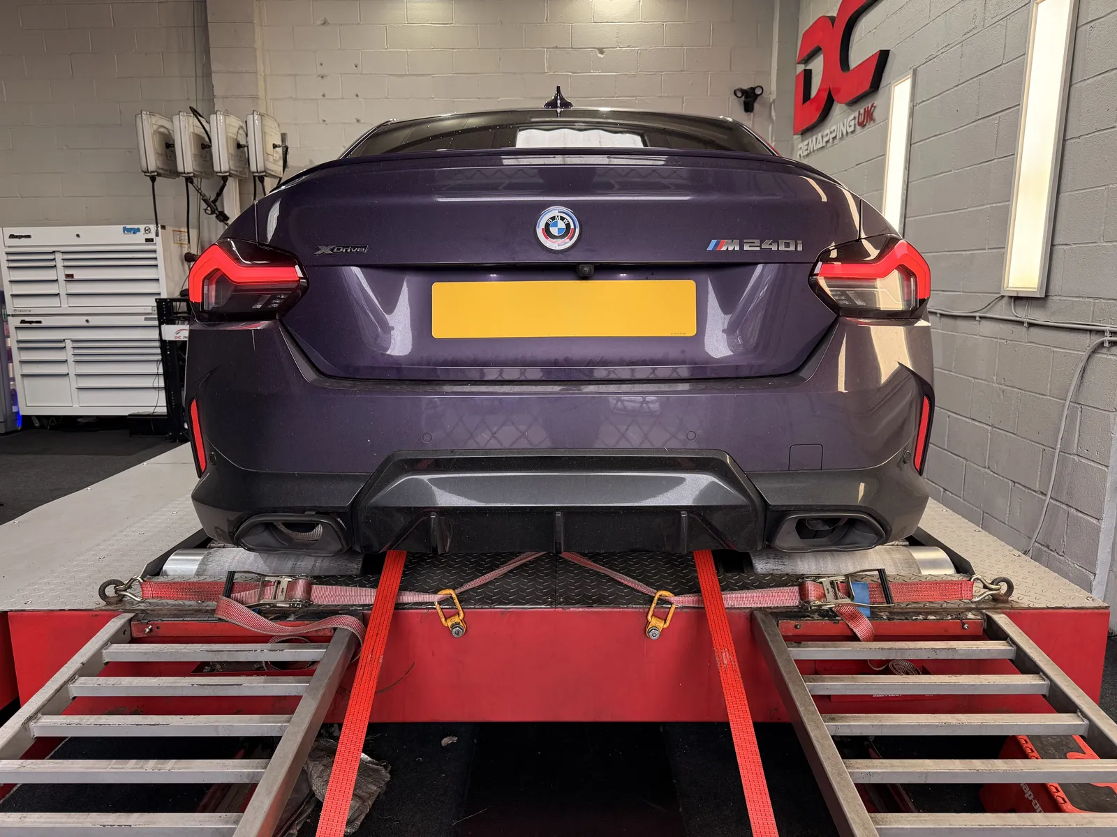 BMW M240i xDrive rear view on the dyno