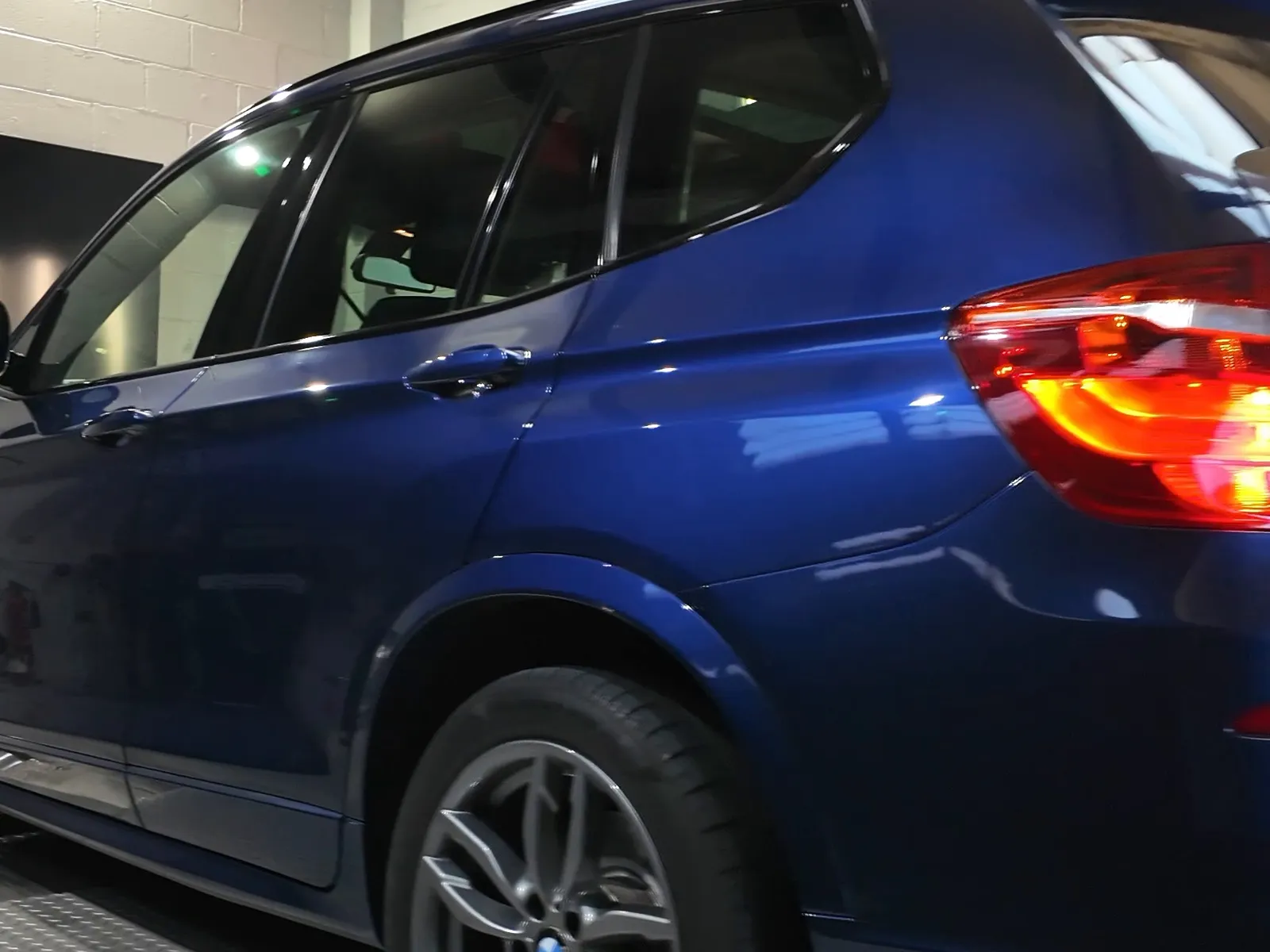 BMW X3 xDrive30d rear three-quarter on the dyno