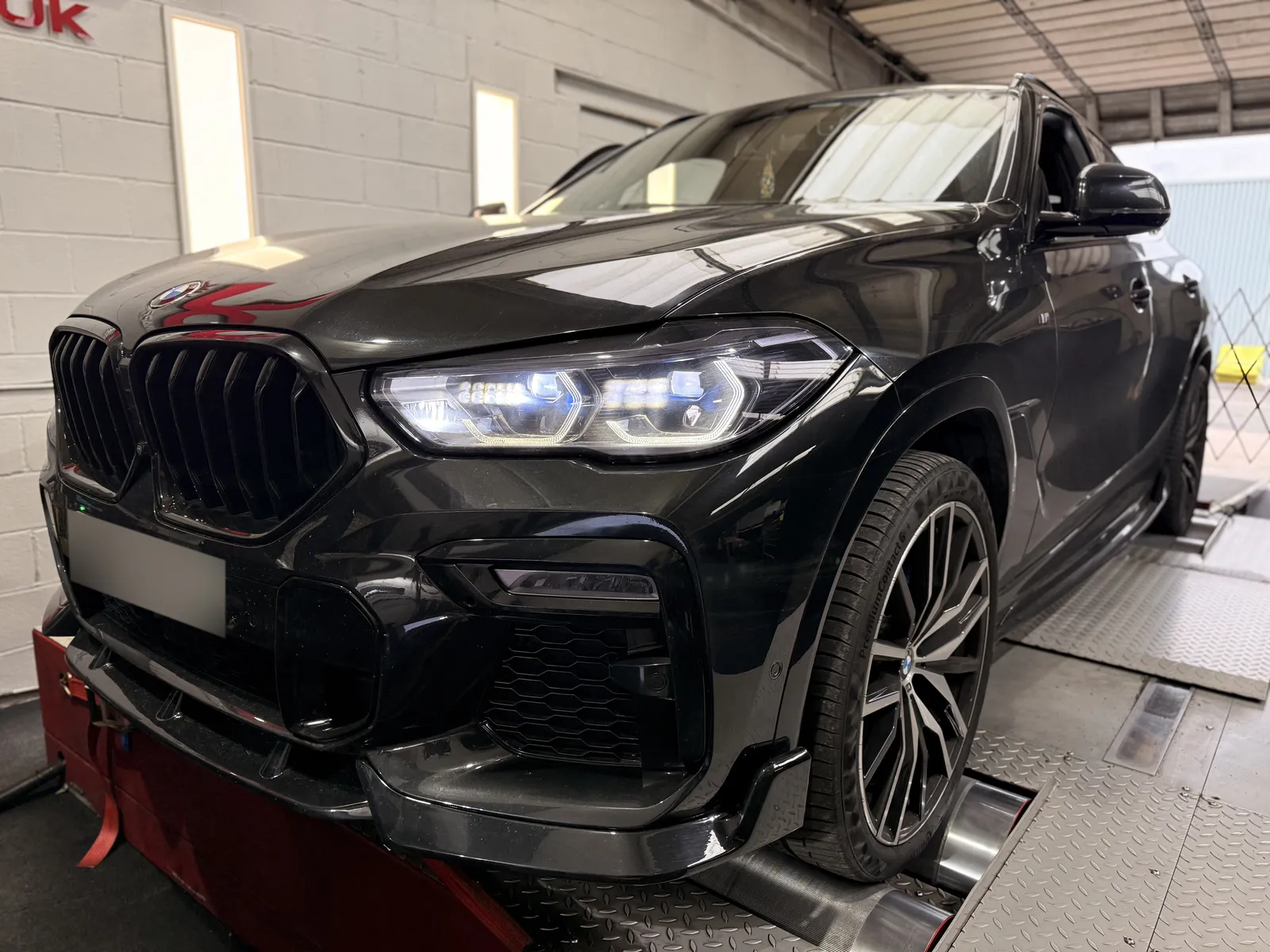 BMW X6 M50d front quarter on the dyno